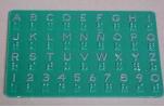Plaque métallique présentant en relief l'alphabet majuscule noir et braille